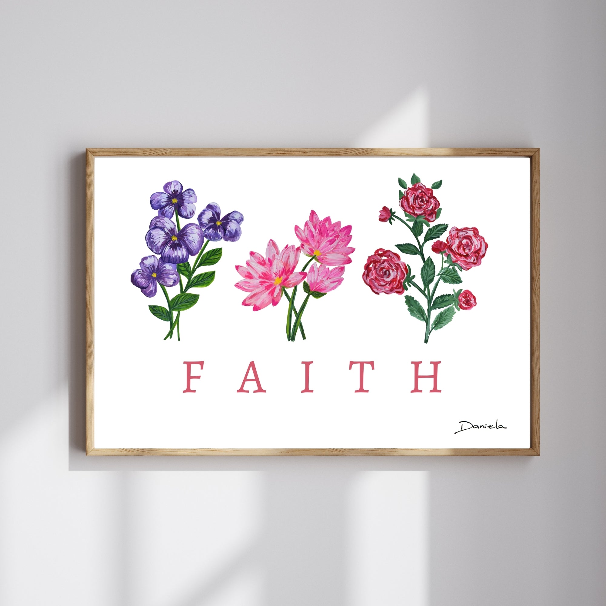 Framed artwork with floral designs and the word &